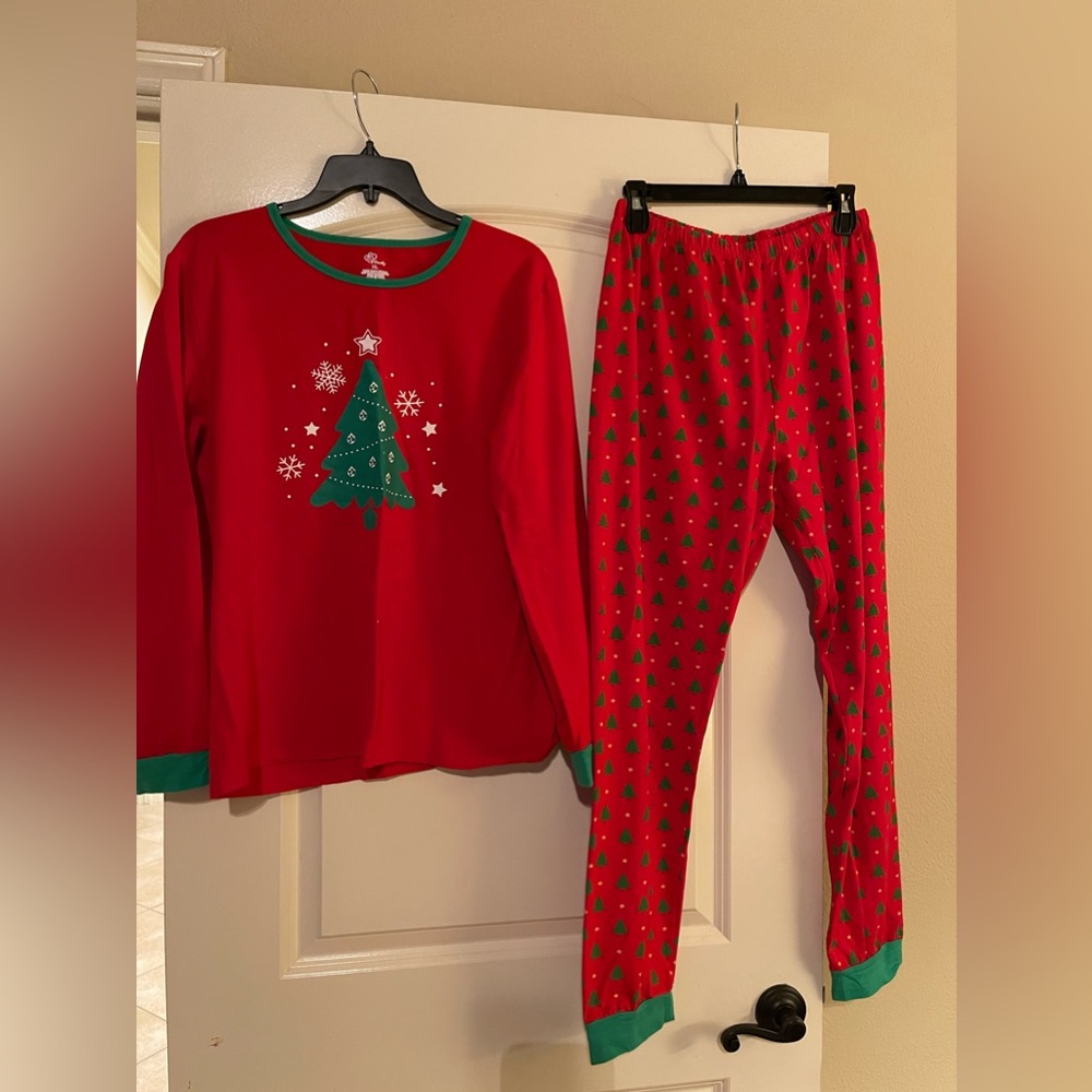 Family of 4 Christmas PJs worn once. $50 total for all 4 pairs.